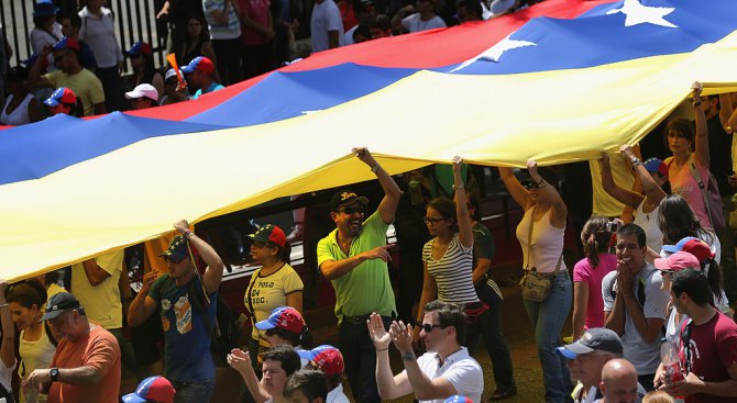 Кръв се ля на протестите във Венецуела (видео)