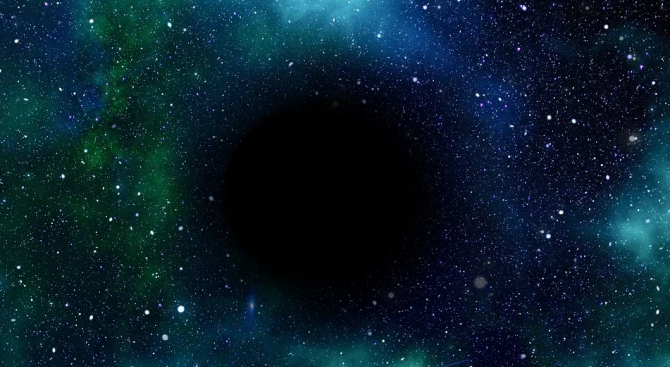 Астрономи откриха черна дупка с огромна маса в далечна галактика
