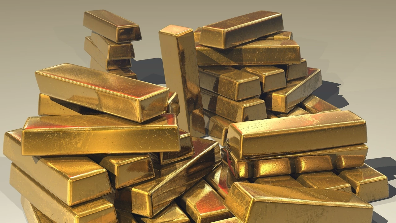 Цените на златото достигнаха едномесечен връх тласнати нагоре от по слабия